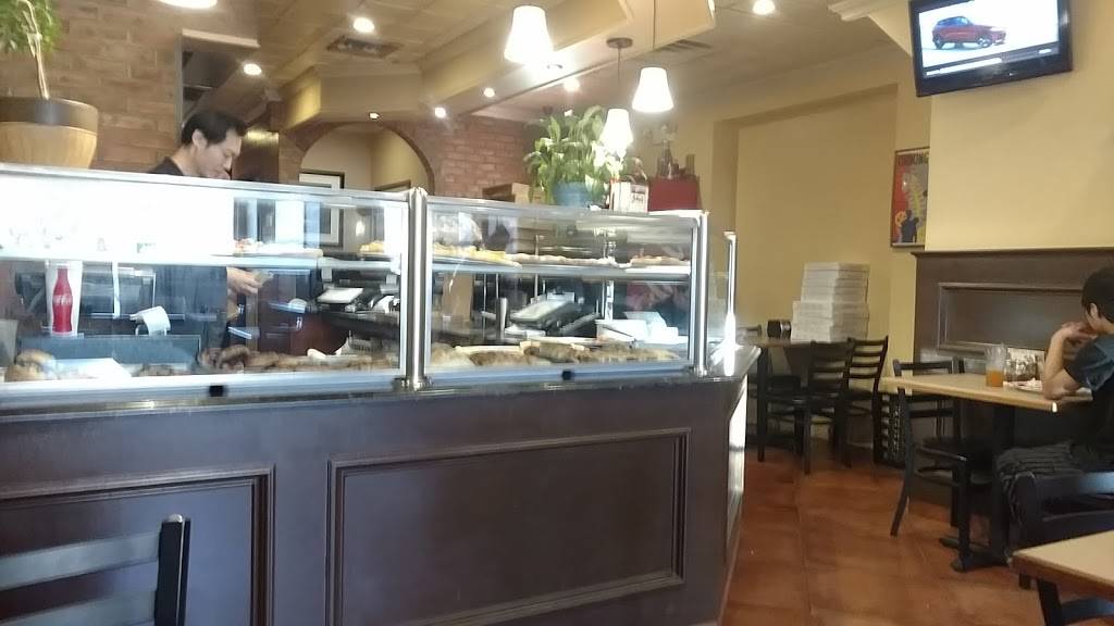 Johns Pizzeria | restaurant | 83-40 Parsons Blvd, Jamaica, NY 11432, USA | 7185231381 OR +1 718-523-1381