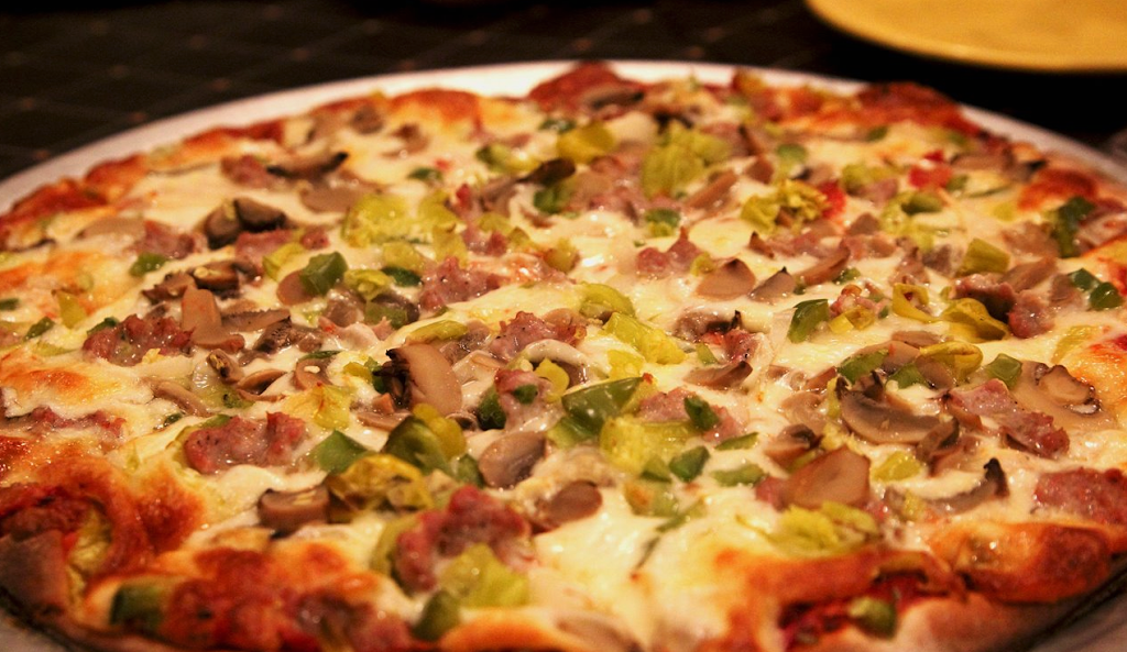 Johns Pizzaria | restaurant | 221 N Franklin St, Port Washington, WI 53074, USA | 2622845581 OR +1 262-284-5581
