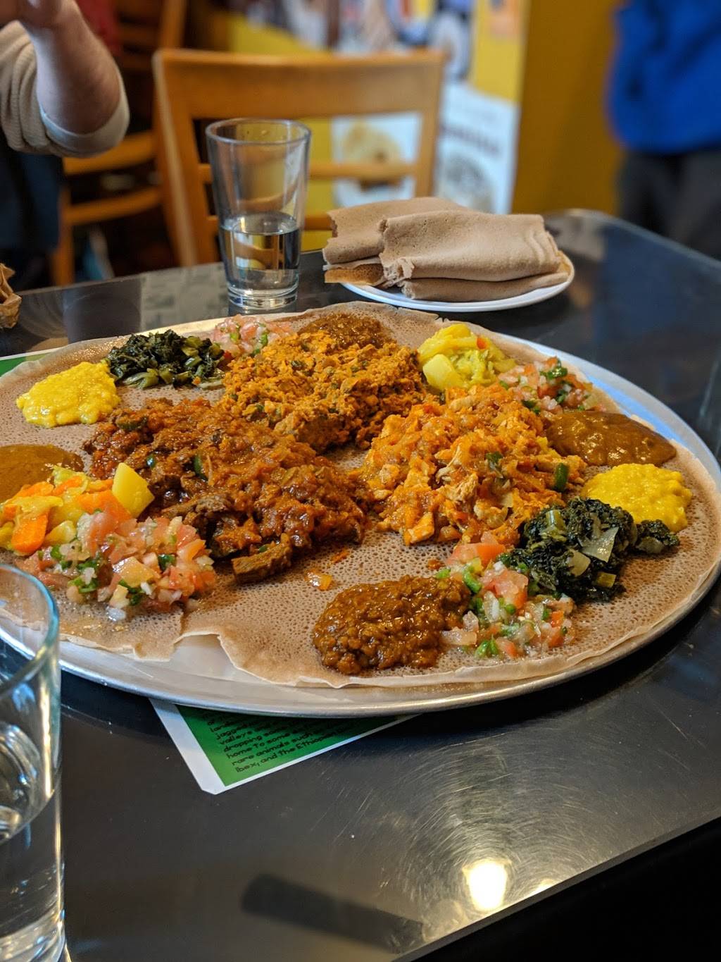 Buna Ethiopian Restaurant & Market | cafe | 1034 S Fairfax Ave, Los Angeles, CA 90019, USA | 3239649731 OR +1 323-964-9731