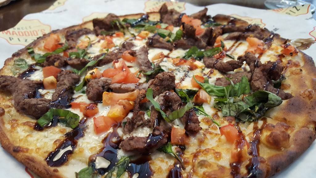 Uncle Maddios Pizza - Waterford | restaurant | 703 N Alafaya Trail, Orlando, FL 32828, USA | 4079142881 OR +1 407-914-2881