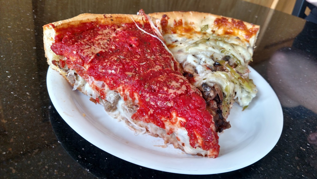 Art of Pizza on State Street | restaurant | 727 S State St, Chicago, IL 60605, USA | 3128775335 OR +1 312-877-5335