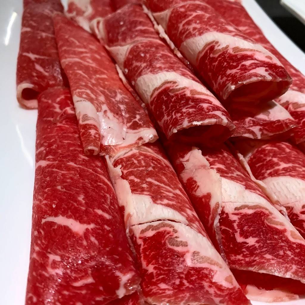 The Nine Realm Hotpot Restaurant | restaurant | 301 James St N, Hamilton, ON L8L 1H3, Canada | 2893896506 OR +1 289-389-6506