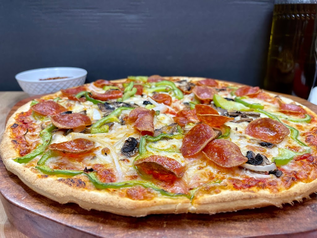 Manny & Olgas Pizza | restaurant | 1430 Pennsylvania Ave. SE, Washington, DC 20003, USA | 2025715252 OR +1 202-571-5252