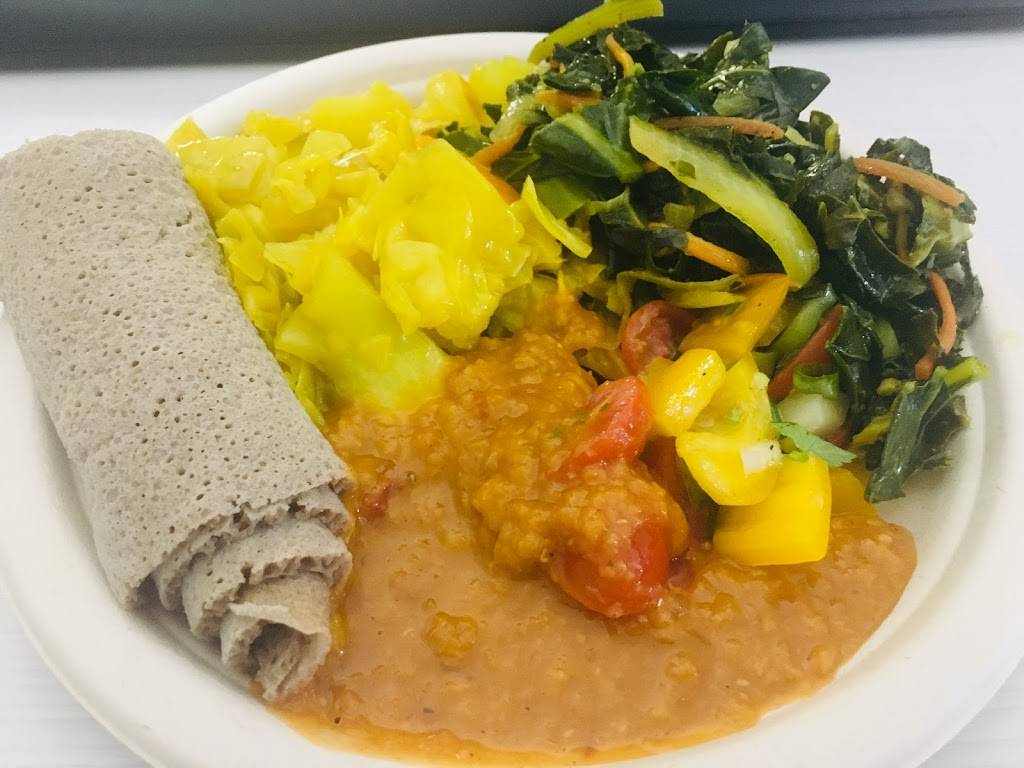 Genis Ethiopian | restaurant | 501 2nd Ave W, Seattle, WA 98199, USA | 6412331057 OR +1 641-233-1057