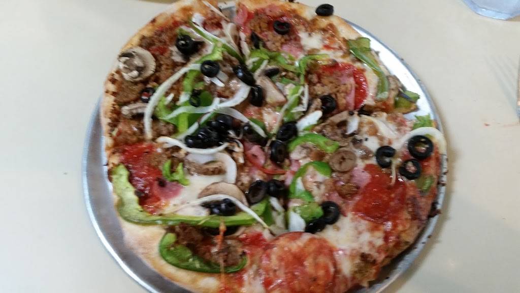 Pizza Shack | restaurant | 8676, 115 W Montgomery St, Willis, TX 77378, USA | 9368569780 OR +1 936-856-9780