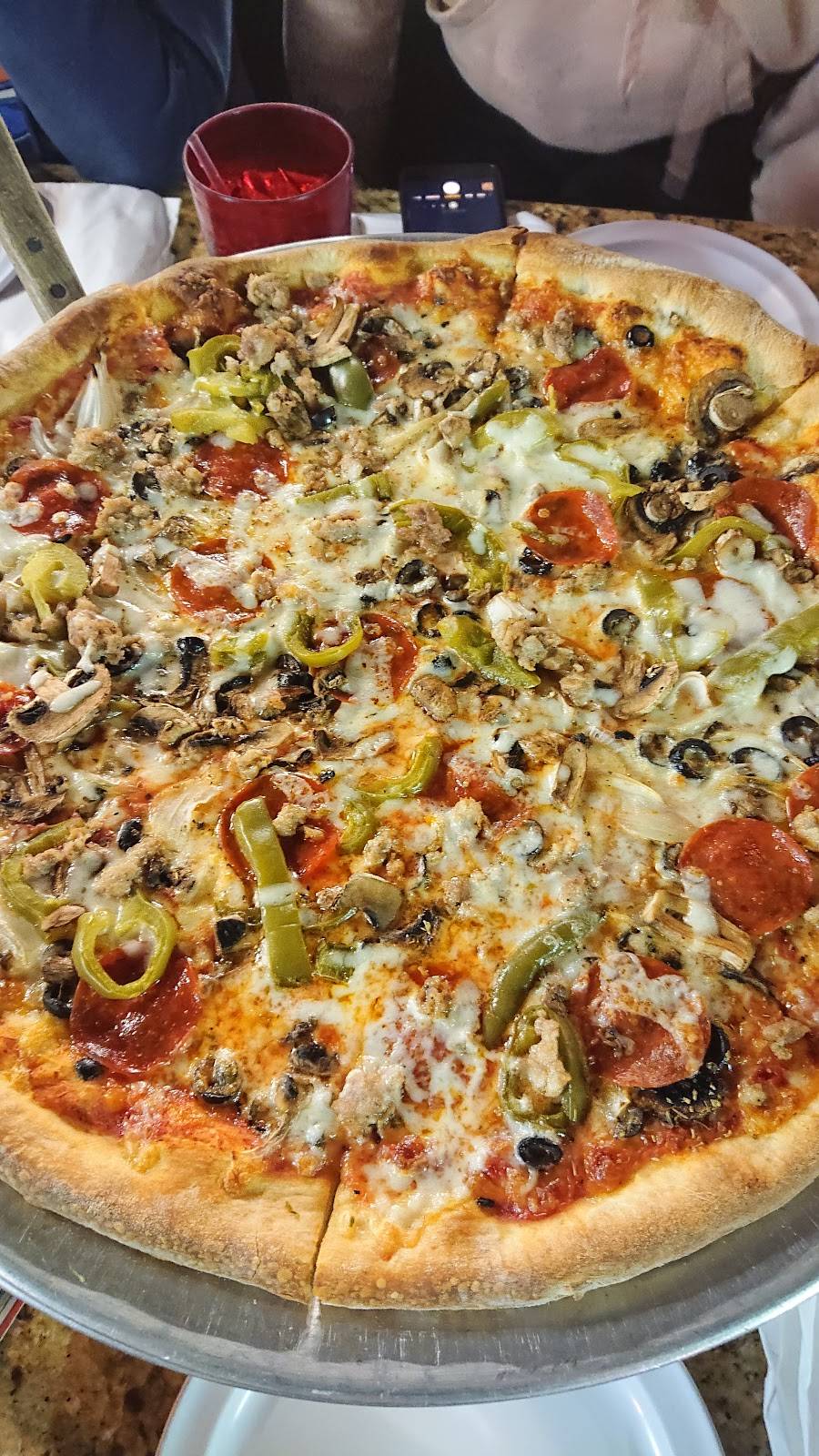 Ricos Pizzeria | restaurant | 5131 N Tamiami Trail, Sarasota, FL 34234, USA | 9413589958 OR +1 941-358-9958