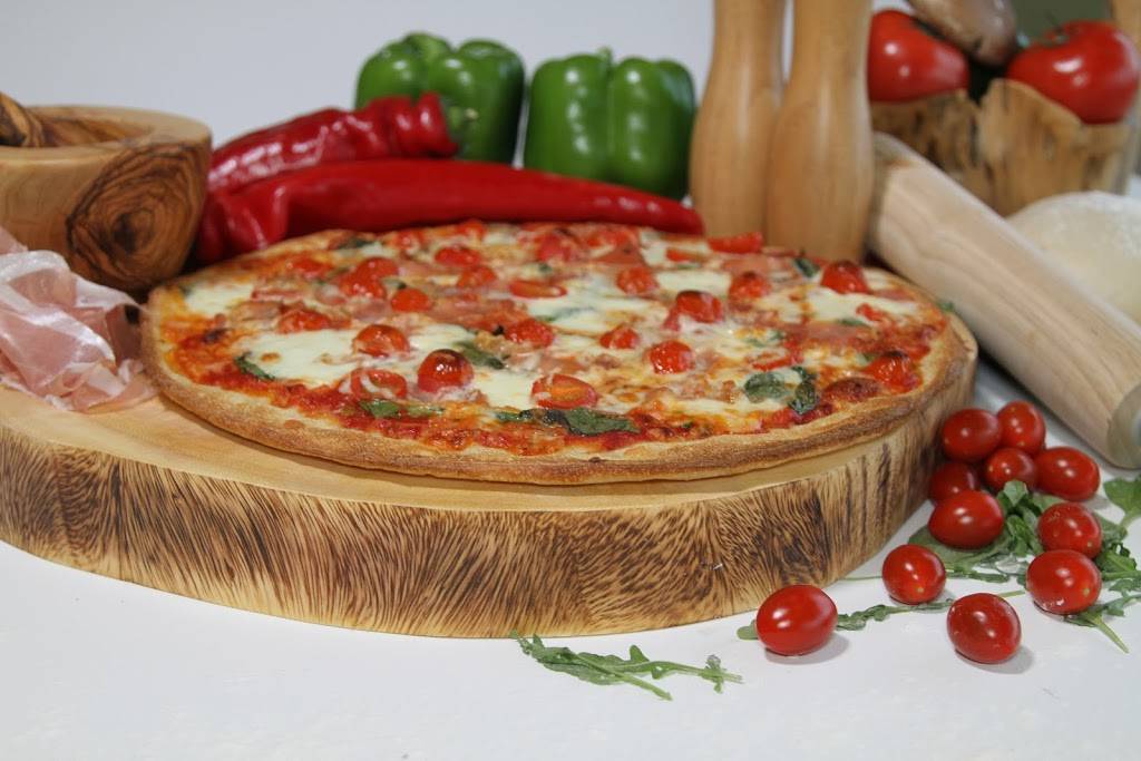 Fabios Pizza | restaurant | 300 Fourth Ave #4, St. Catharines, ON L2S 0E6, Canada | 9056851733 OR +1 905-685-1733