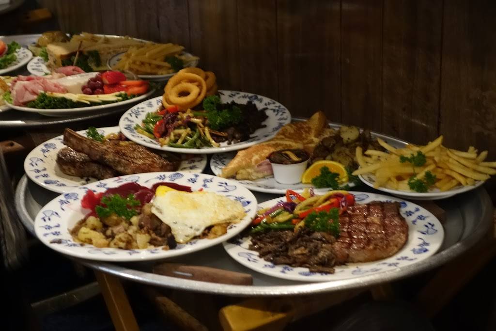 Al Johnson’s | restaurant | 10698 N Bay Shore Dr, Sister Bay, WI 54234, USA | 9208542626 OR +1 920-854-2626