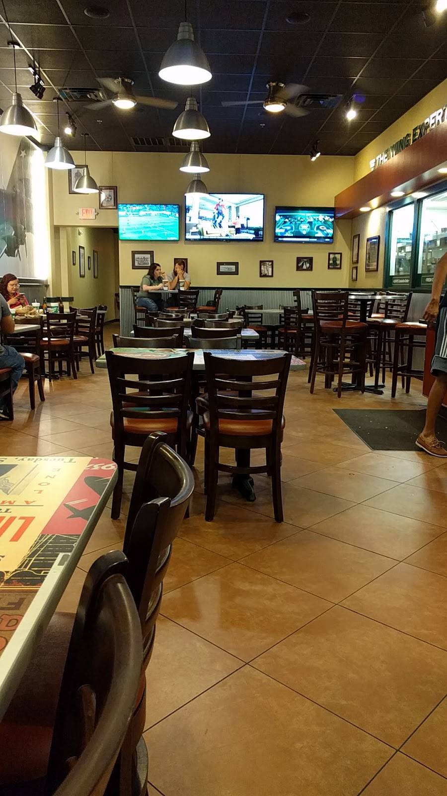 Wingstop | restaurant | 12717 Interstate 45 N Ste 100, Willis, TX 77318, USA | 9368909464 OR +1 936-890-9464