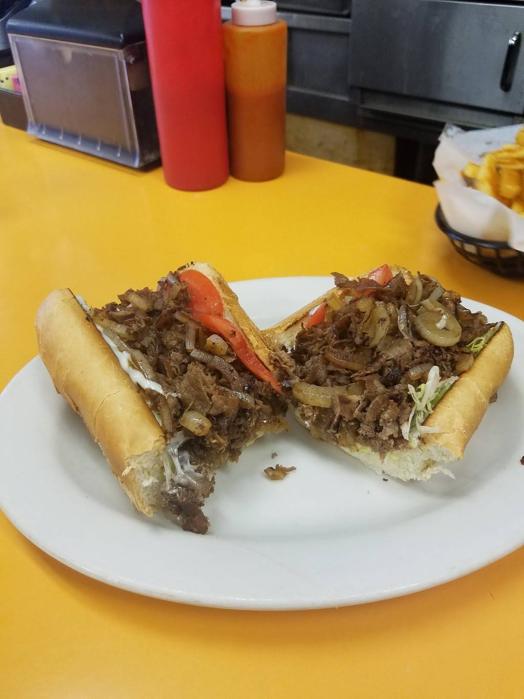 Peters Carryout | restaurant | 8017 Wisconsin Ave, Bethesda, MD 20814, USA | 3016562242 OR +1 301-656-2242