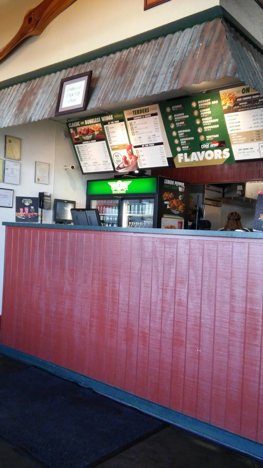 Wingstop | restaurant | 10841 W Florissant Ave, St. Louis, MO 63136, USA | 3145229696 OR +1 314-522-9696