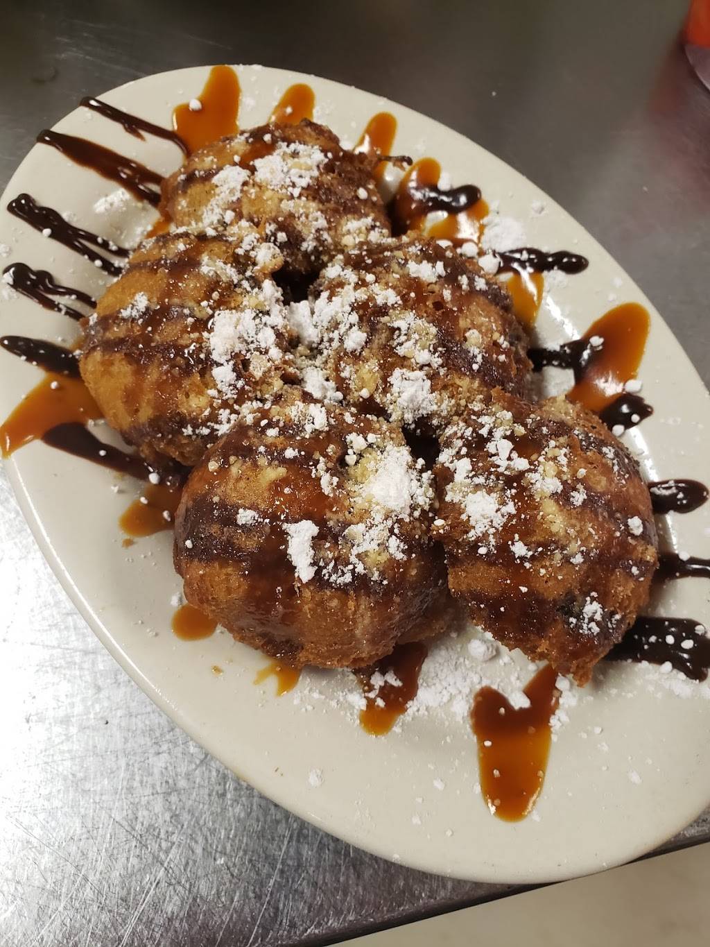 The House: Downtown Grill | restaurant | 105 S Brewer St, Paris, TN 38242, USA | 7319244111 OR +1 731-924-4111