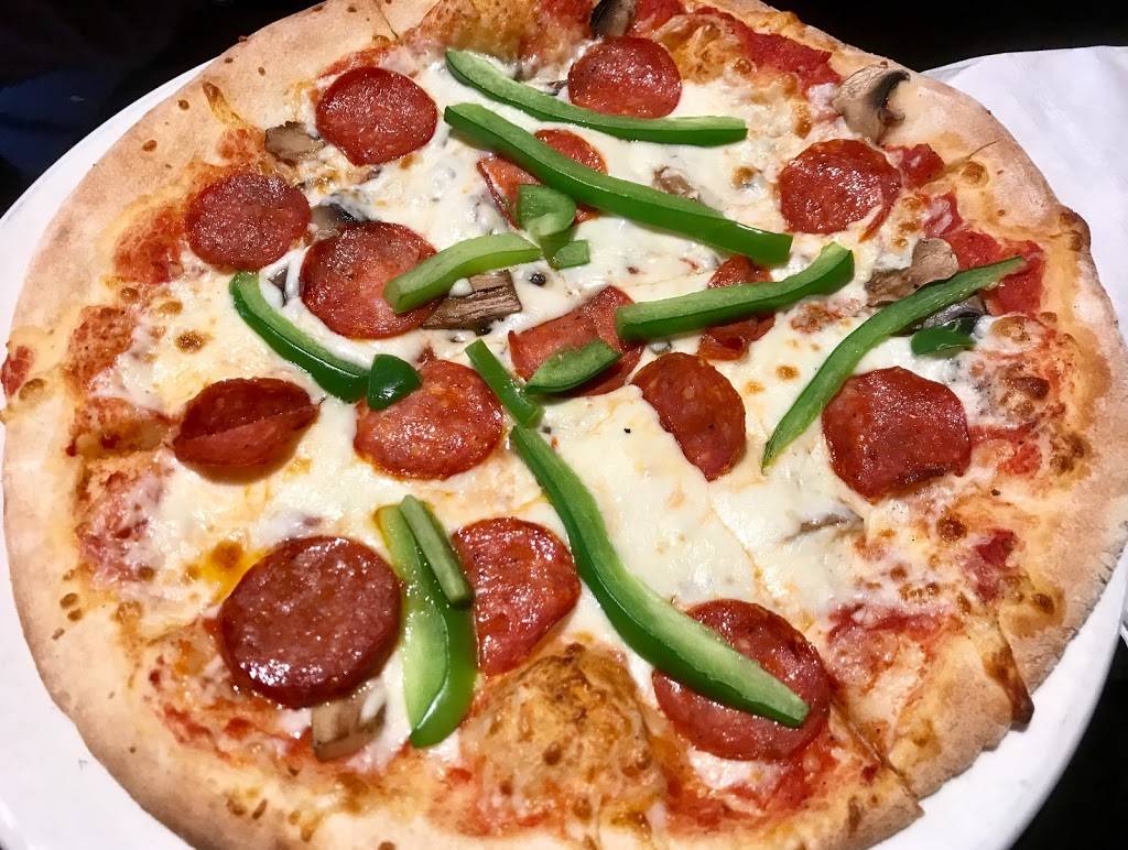 Wooden Heads Gourmet Pizza | restaurant | 192 Ontario St, Kingston, ON K7L 2Y8, Canada | 6135491812 OR +1 613-549-1812