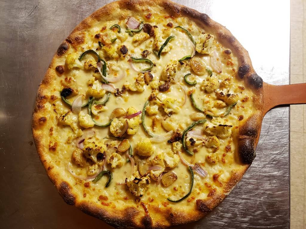 Celestial Pizza | restaurant | 1413 Webberville Rd, Austin, TX 78721, USA | 5127493313 OR +1 512-749-3313