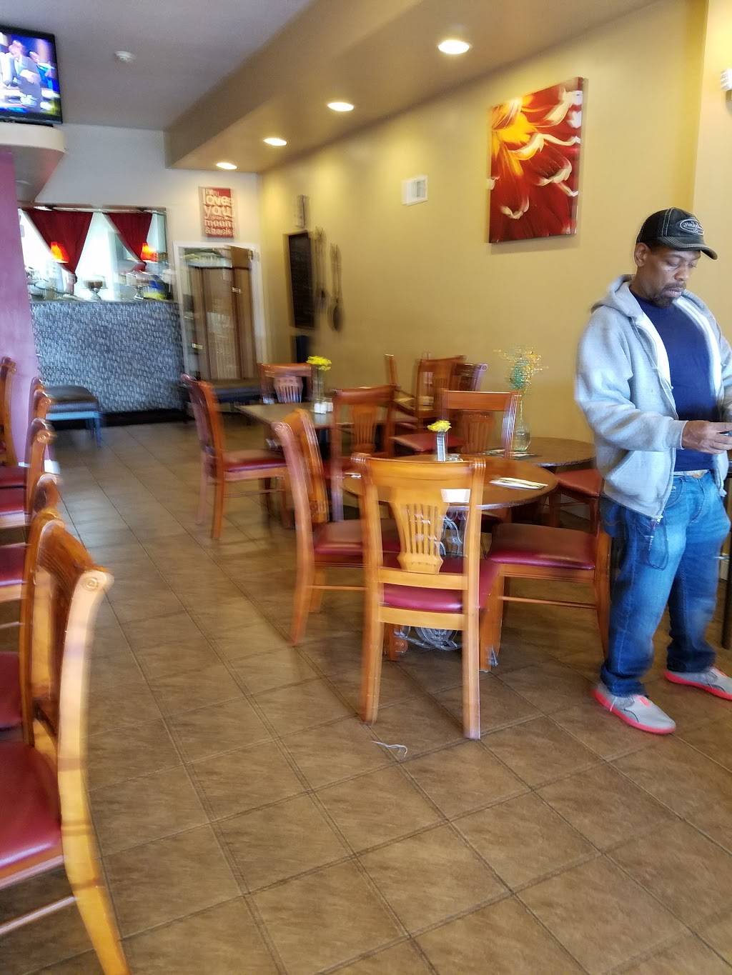 The Crimson Cafe | restaurant | 5847 Market St, Philadelphia, PA 19139, USA | 2154722233 OR +1 215-472-2233