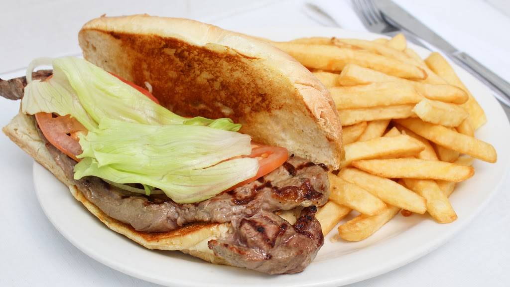 Friedas Place | restaurant | 210 Pinebush Rd, Cambridge, ON N1R 8A9, Canada | 5197408880 OR +1 519-740-8880