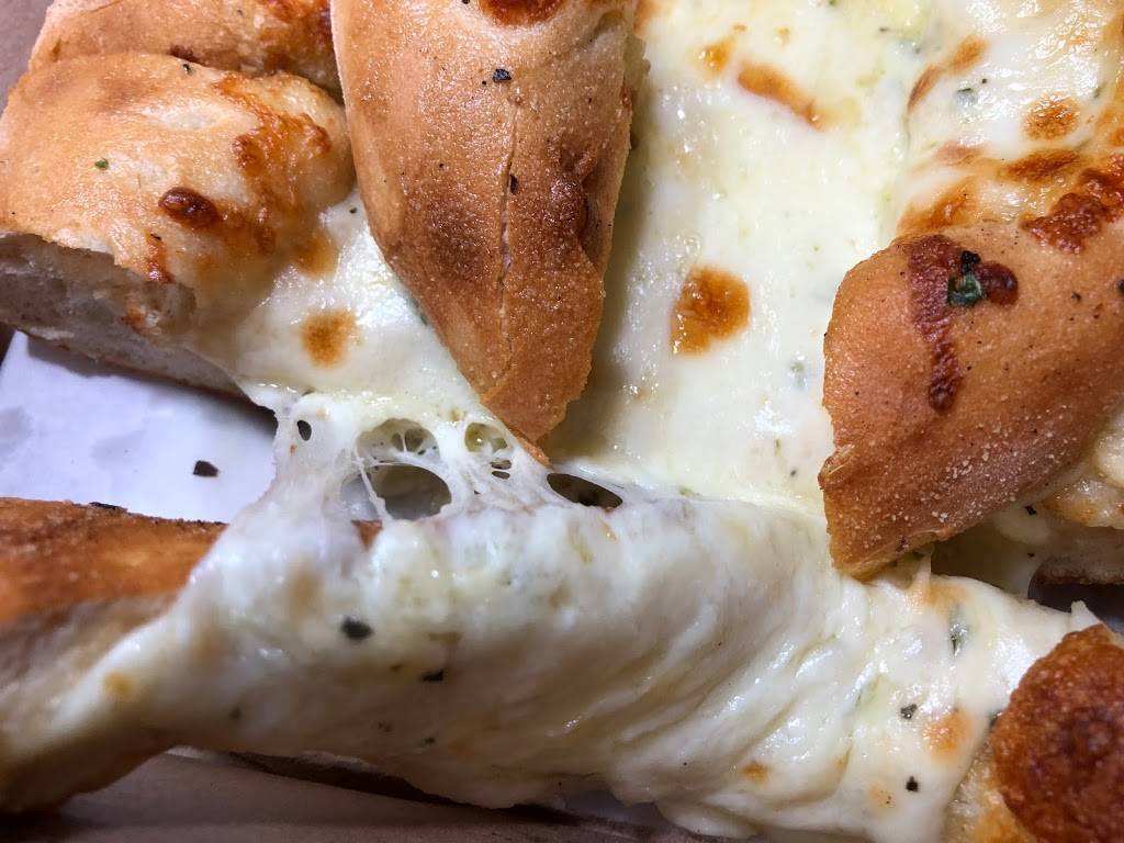 Dans Pizza ”In The Mont” | restaurant | 12373 Scarsdale Blvd Suite C, Houston, TX 77089, USA | 2813699000 OR +1 281-369-9000