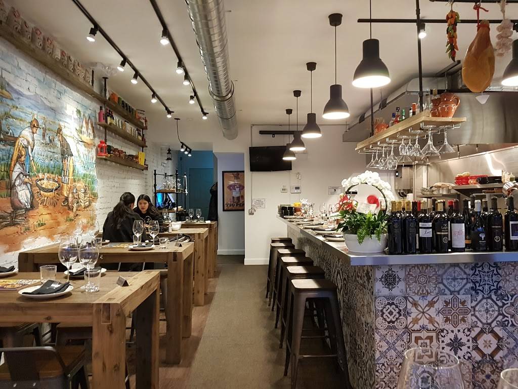 La Paella | restaurant | 1146 Queen St E, Toronto, ON M4M 1L1, Canada | 4165461055 OR +1 416-546-1055