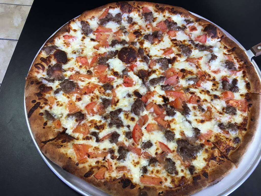 Jonuzis Pizza | restaurant | 1776 Teasley Ln #103, Denton, TX 76205, USA | 9405650000 OR +1 940-565-0000