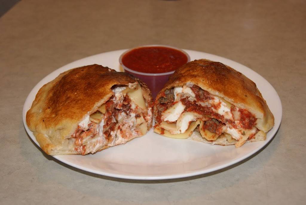 Wagon Wheel Pizza of Melbourne | restaurant | 3082 Lake Washington Rd, Melbourne, FL 32934, USA | 3212547411 OR +1 321-254-7411