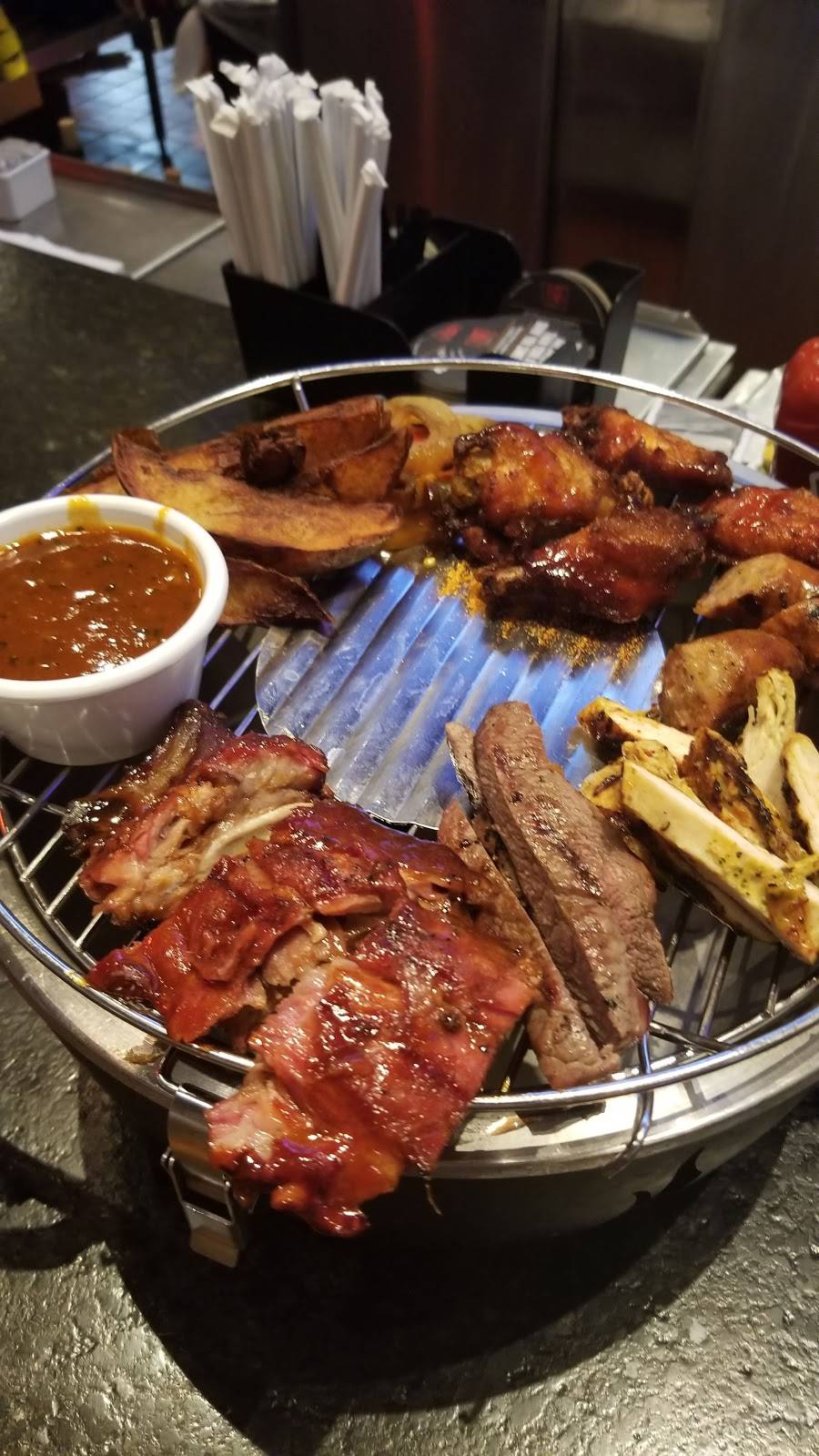 Smokey Bones Bar & Fire Grill | meal takeaway | 1510 W New Haven Ave, Melbourne, FL 32904, USA | 3219519777 OR +1 321-951-9777