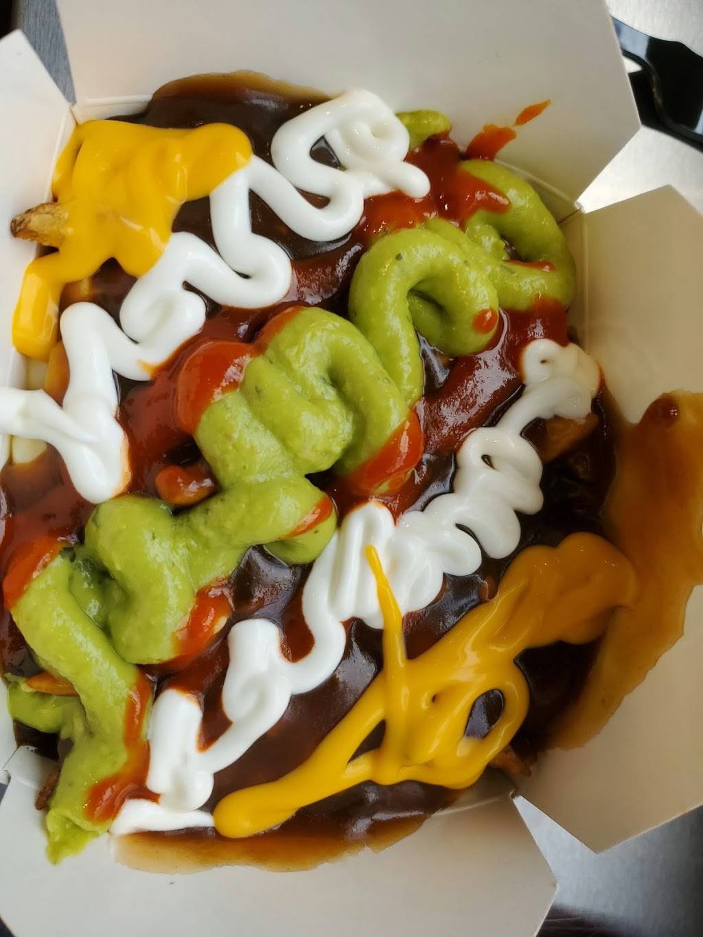 Smokes Poutinerie | restaurant | 85 Resolution Dr, Brampton, ON L6W 0A6, Canada | 9054502922 OR +1 905-450-2922