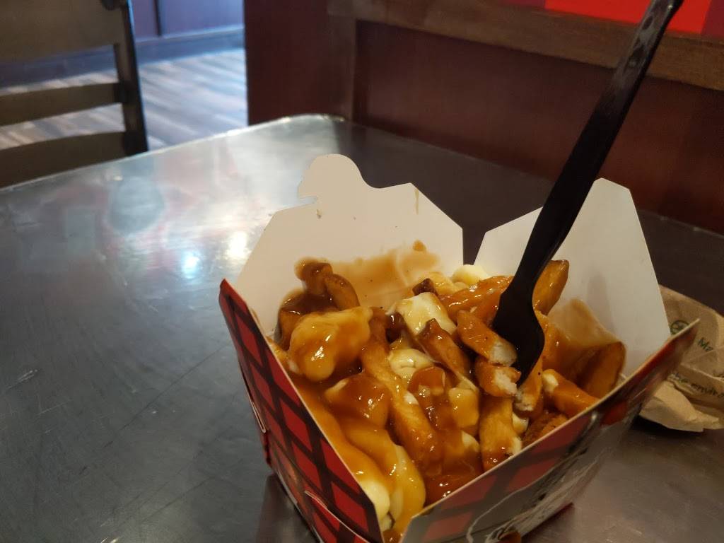 Smokes Poutinerie | restaurant | 20 Wyndham St N, Guelph, ON N1H 4E5, Canada | 5197802617 OR +1 519-780-2617