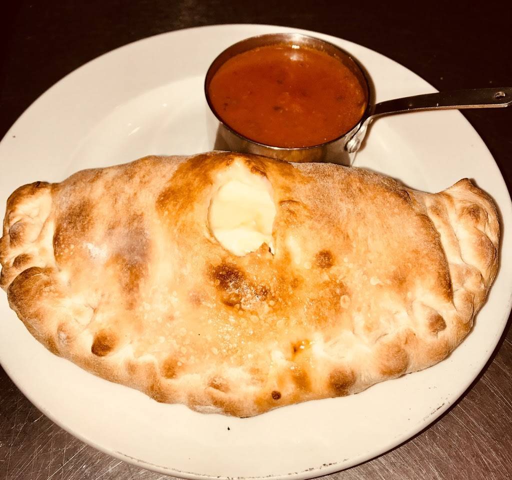 Carinis Pizzaria & Trattoria | restaurant | 24611 Production Cir, Bonita Springs, FL 34135, USA | 2399497770 OR +1 239-949-7770