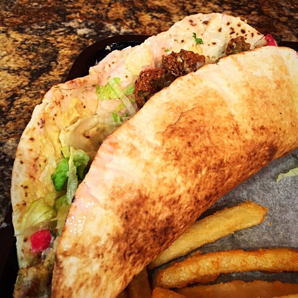 Madistan | restaurant | 317 N Bassett St, Madison, WI 53703, USA | 6084225422 OR +1 608-422-5422