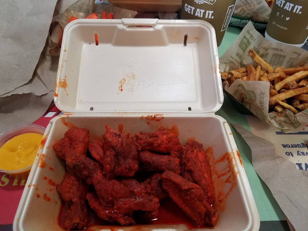 Wingstop | restaurant | 9164 Overland Plaza, Overland, MO 63114, USA | 3144279464 OR +1 314-427-9464