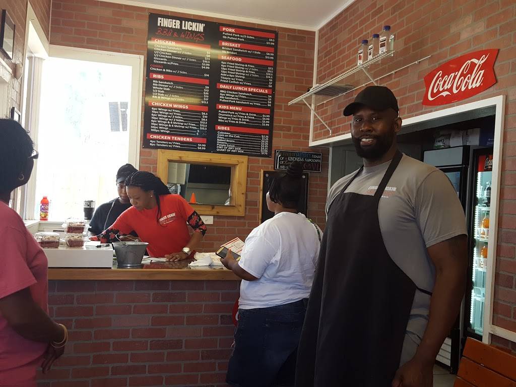 Finger Lickin BBQ & Wings | restaurant | 218 N Orange St, New Smyrna Beach, FL 32168, USA | 3864103427 OR +1 386-410-3427