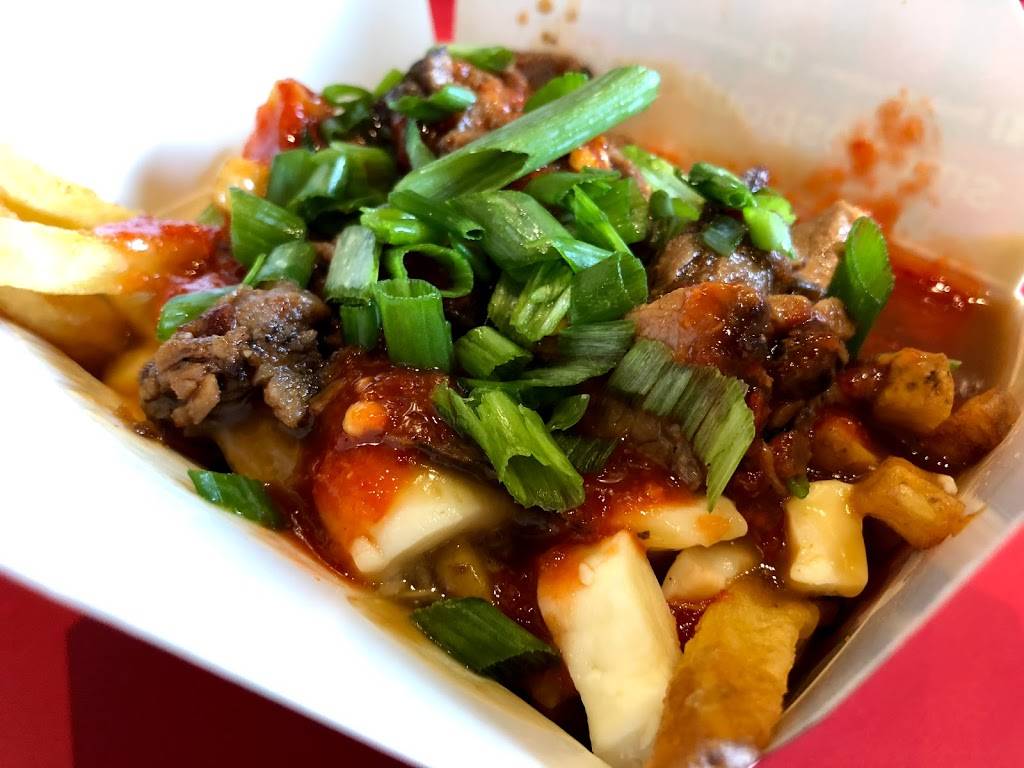 Smokes Poutinerie | restaurant | 4032 Confederation Pkwy, Mississauga, ON L5B 0G4, Canada | 9052322873 OR +1 905-232-2873