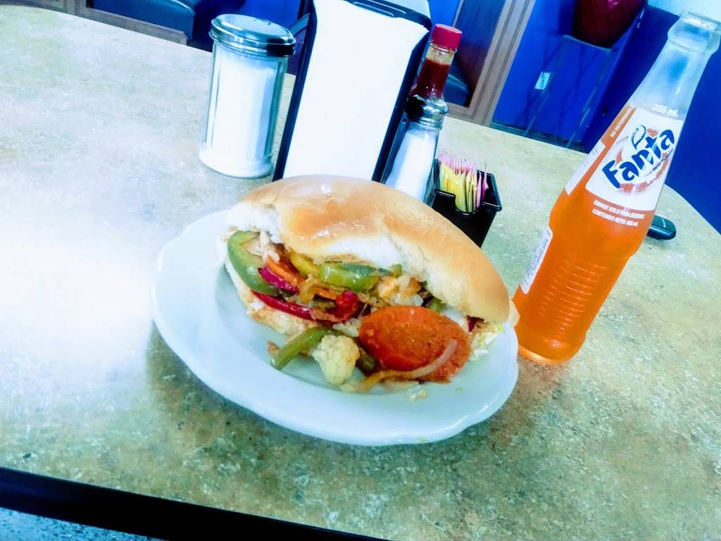 Panaderia & Pupuseria Candelaria de la Frontera | restaurant | 632 N Miami Ave, Marshall, MO 65340, USA | 6608154557 OR +1 660-815-4557