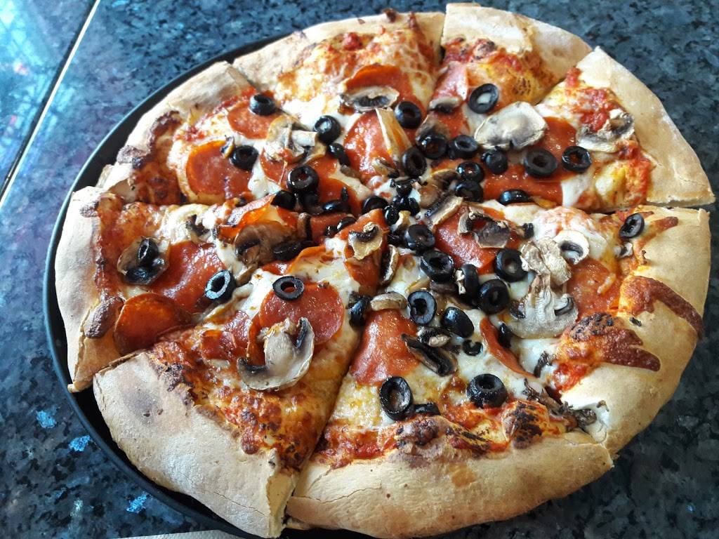 Ricks Pizza, Beer, & More | restaurant | 1305 N Virginia St, Reno, NV 89503, USA | 7754205259 OR +1 775-420-5259