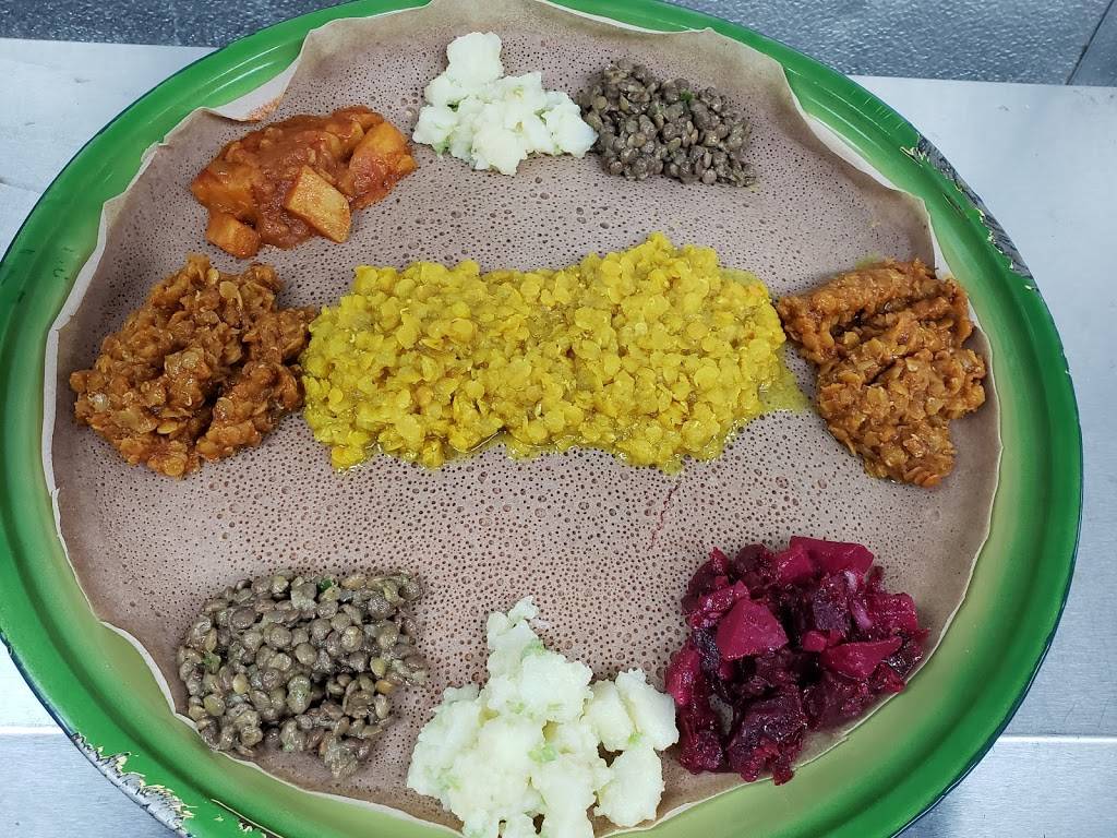 Mitmita Ethiopian Restaurant | restaurant | 4901 W Linebaugh Ave, Tampa, FL 33624, USA | 8134152183 OR +1 813-415-2183
