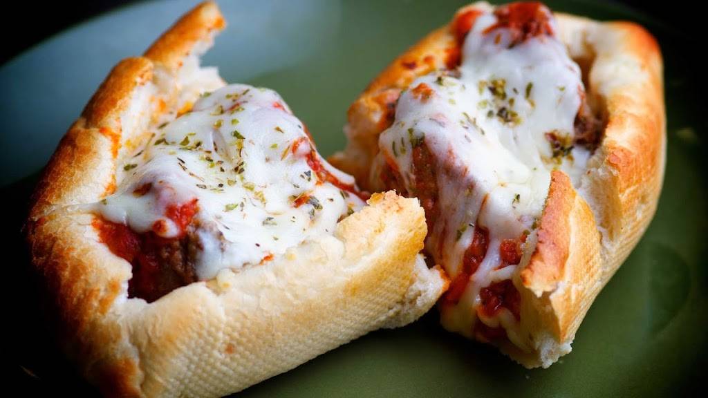 Carmelos Pizzeria | restaurant | 146 W King St, St. Augustine, FL 32084, USA | 9044946658 OR +1 904-494-6658