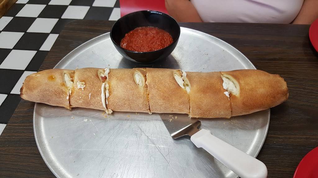 Luigis Pizza & Italian Restaurant | restaurant | 3138 N Woodland Blvd, DeLand, FL 32720, USA | 3867360145 OR +1 386-736-0145