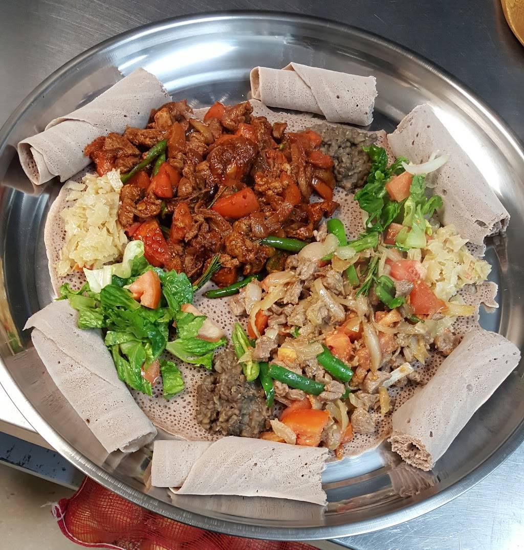 Axum Ethiopian Restaurant | restaurant | 825 N Pennsylvania St, Indianapolis, IN 46204, USA | 3179640580 OR +1 317-964-0580