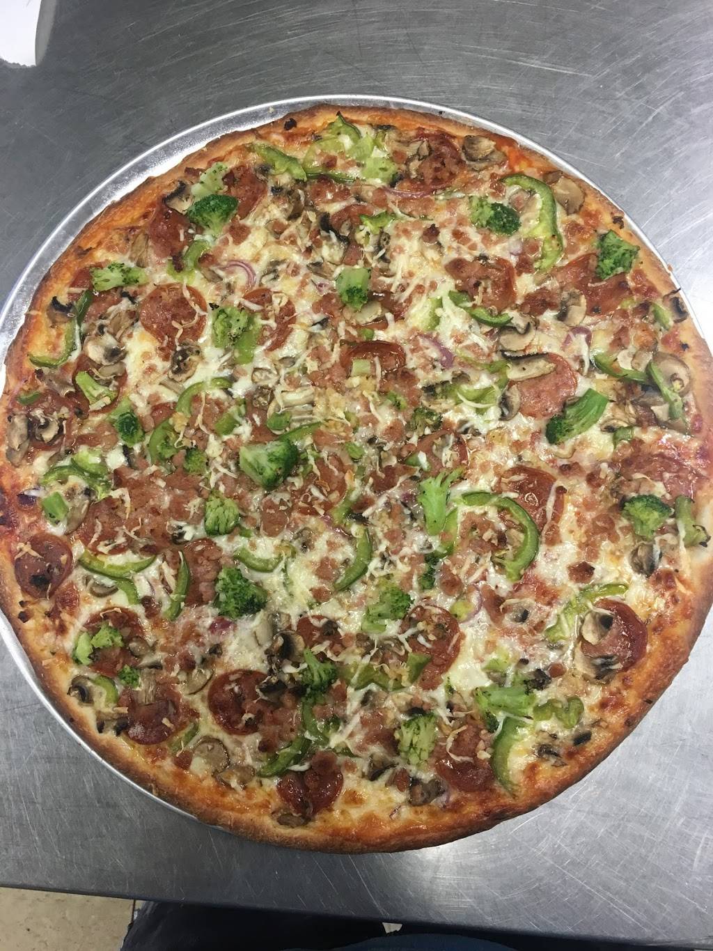 Volcano Pizzeria | restaurant | Lake-Carlton Plaza, 145 Carlton St, St. Catharines, ON L2R 1R5, Canada | 9056412555 OR +1 905-641-2555