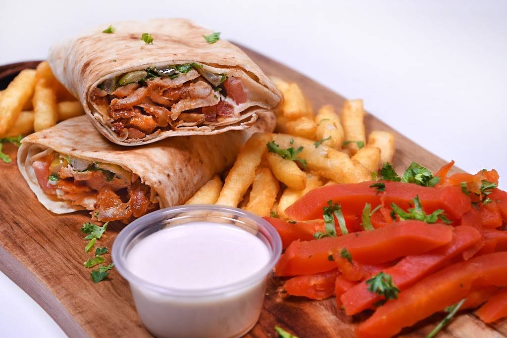 Tahinis Restaurant | restaurant | 595 Fanshawe Park Rd W, London, ON N6G 5B3, Canada | 5196011044 OR +1 519-601-1044