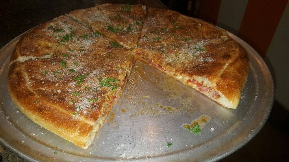 Jonnys Pizza | restaurant | 100 Genesee St, Utica, NY 13502, USA | 3155074577 OR +1 315-507-4577