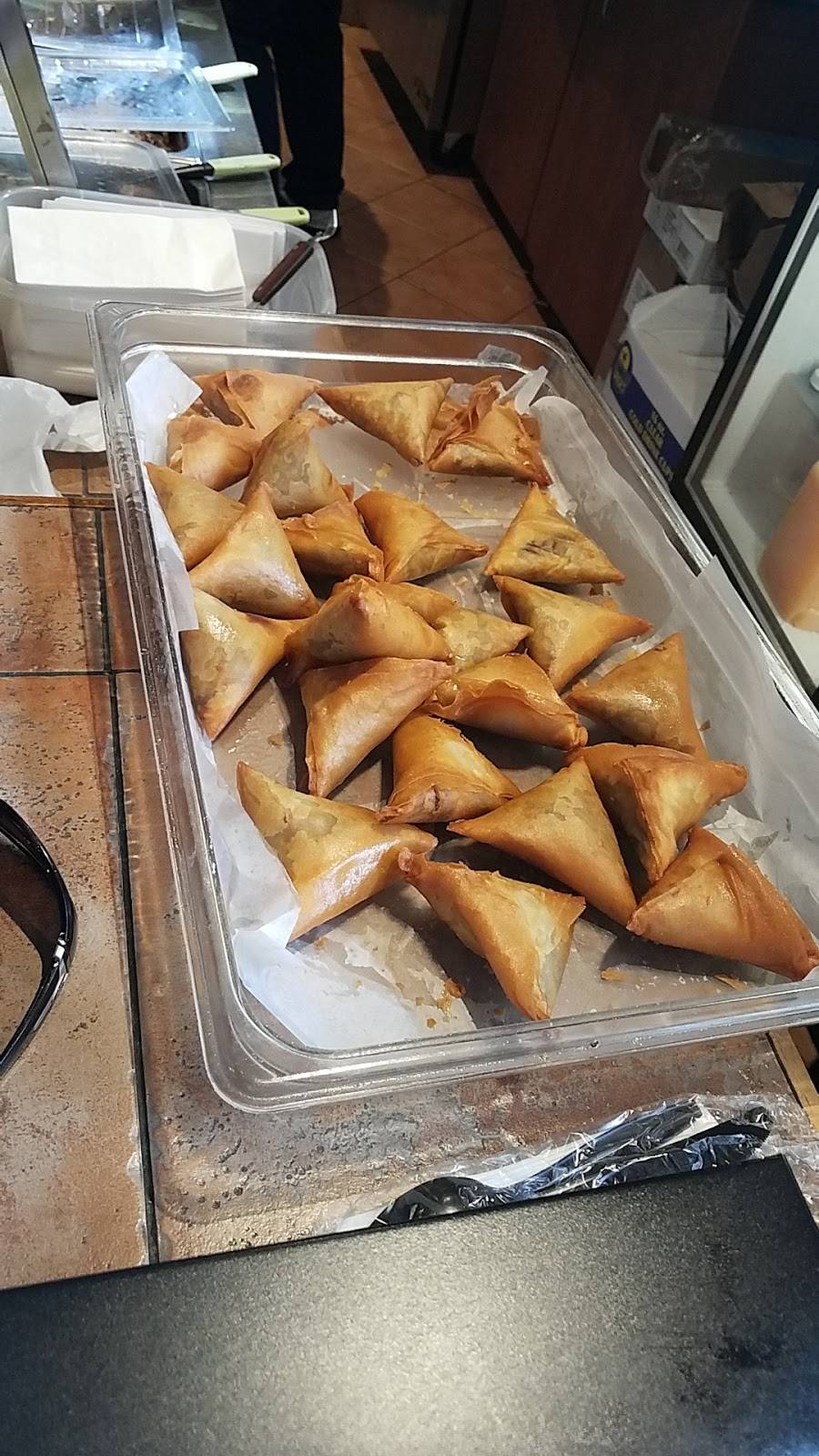 Karibu Restaurant | restaurant | 10 Crescent St, Waltham, MA 02453, USA | 7818997444 OR +1 781-899-7444