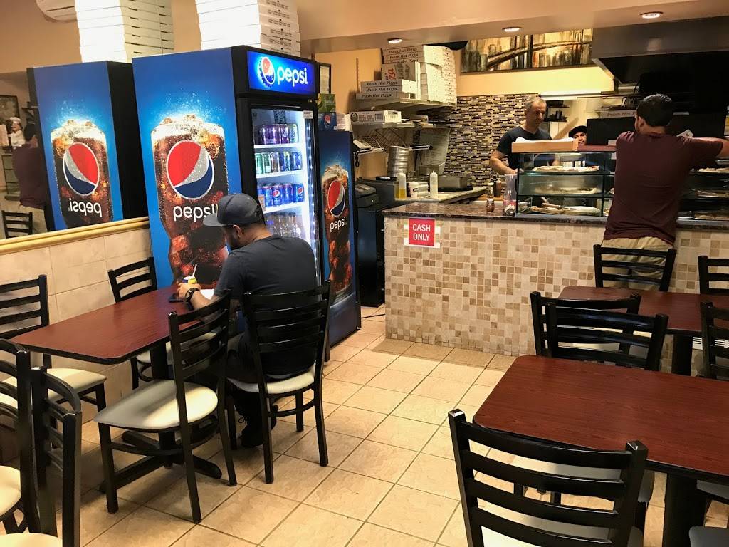 Ginos Express Pizza | restaurant | 62-69 Dry Harbor Rd, Middle Village, NY 11379, USA | 7188061650 OR +1 718-806-1650