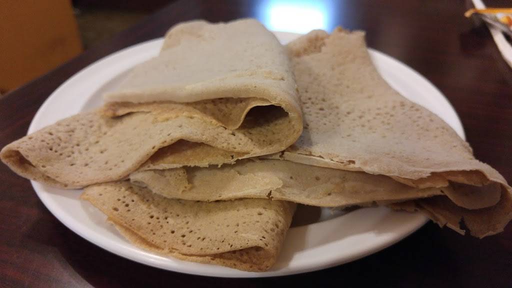 Buna Ethiopian Restaurant & Market | cafe | 1034 S Fairfax Ave, Los Angeles, CA 90019, USA | 3239649731 OR +1 323-964-9731