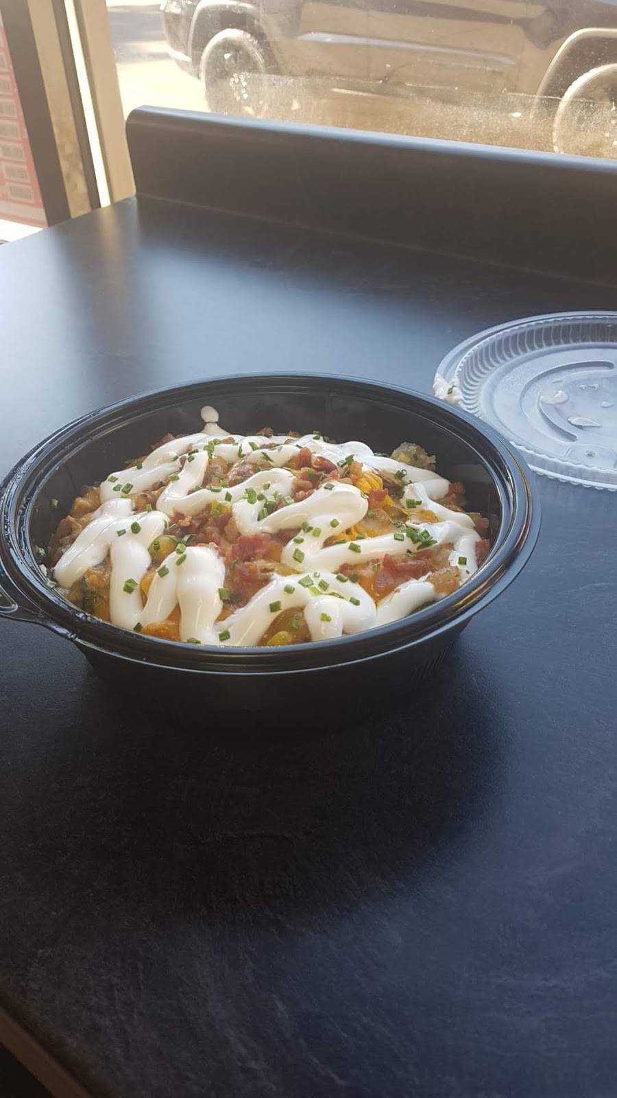 Load a Spud Poatato Bar Chicago | restaurant | 109 E 51st St, Chicago, IL 60615, USA | 7738912405 OR +1 773-891-2405