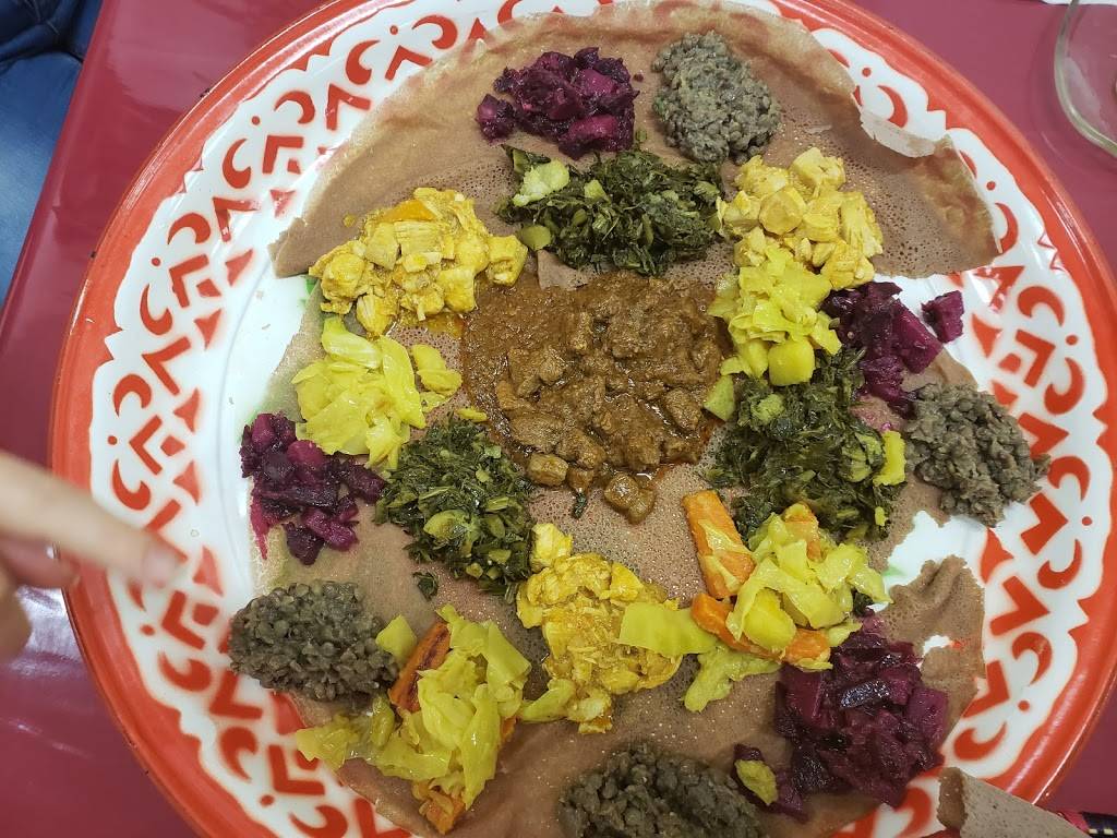 Mitmita Ethiopian Restaurant | restaurant | 4901 W Linebaugh Ave, Tampa, FL 33624, USA | 8134152183 OR +1 813-415-2183