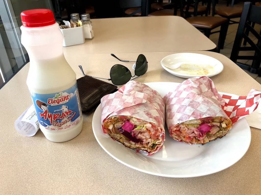 Flame Shawarma & Grill | restaurant | 31 Tapscott Rd, Scarborough, ON M1B 4Y7, Canada | 6477489400 OR +1 647-748-9400