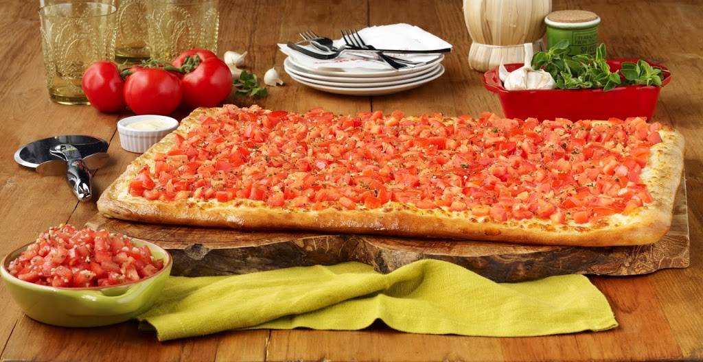 Ginos Pizza | restaurant | 412 Holland St W, Bradford, ON L3Z 2A4, Canada | 9057756666 OR +1 905-775-6666