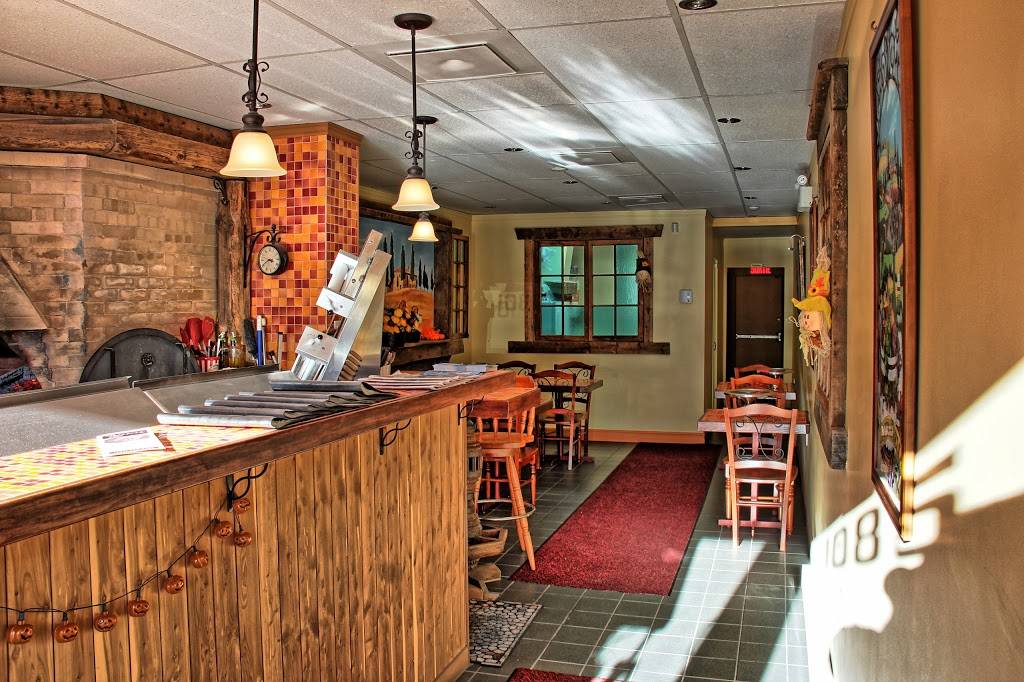 Le Feu De Bois | restaurant | 1126 Boulevard de Sainte-Adèle, Sainte-Adèle, QC J8B 0K2, Canada | 4502290200 OR +1 450-229-0200