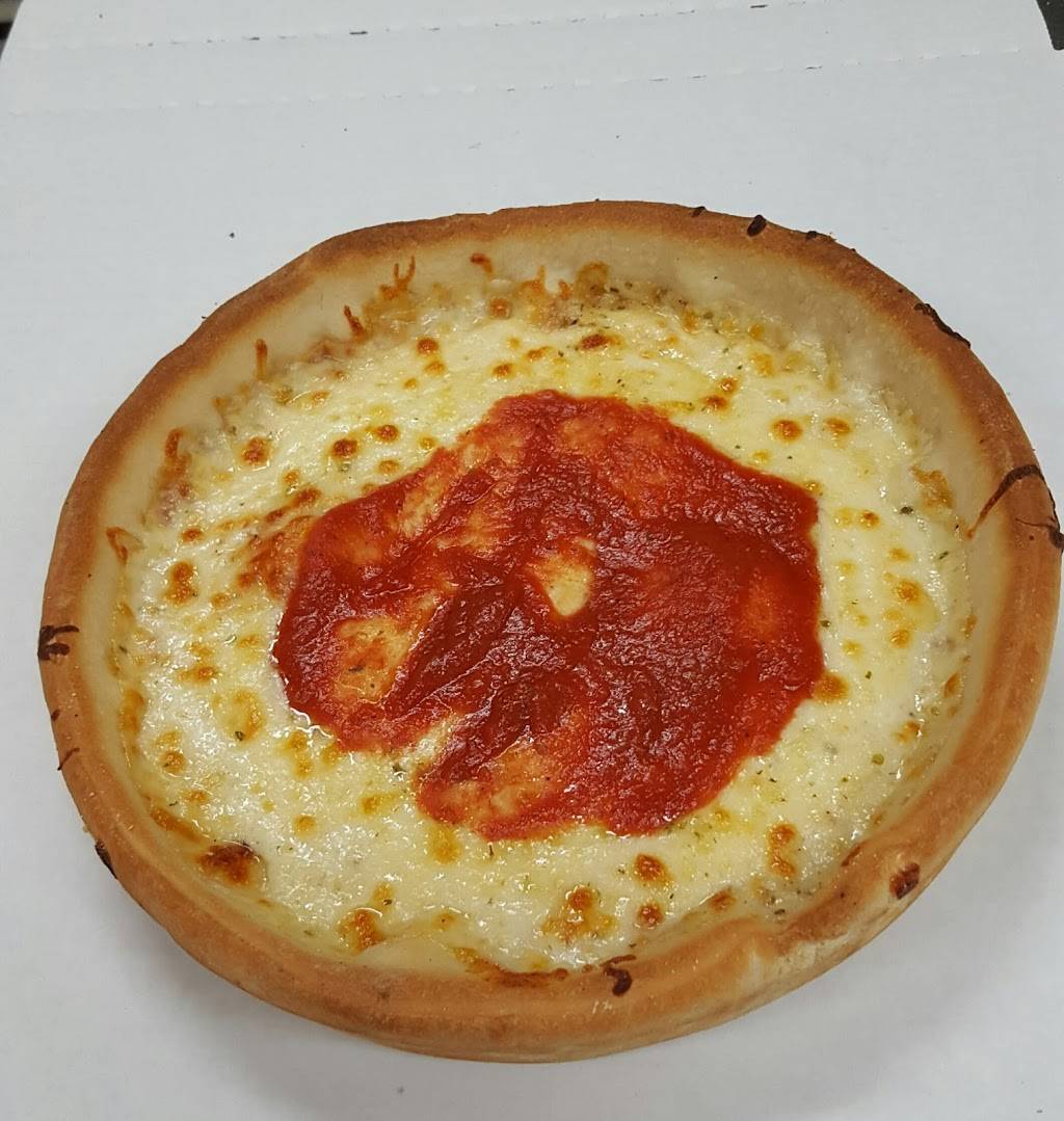 Rico Rinos Pizza | restaurant | 5612 W 87th St, Burbank, IL 60459, USA | 7084224444 OR +1 708-422-4444